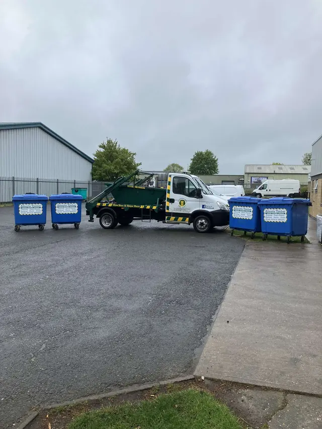 Allsorts skip lorry and 1100 litre bins at the Alford yard